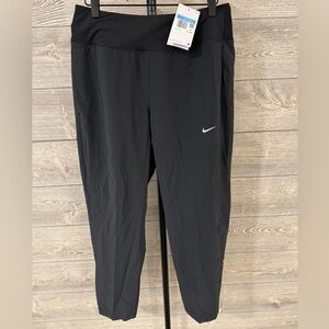 NWT 🎉 Nike Woman’s Dri Fit Swift Mid Rise Running Pants